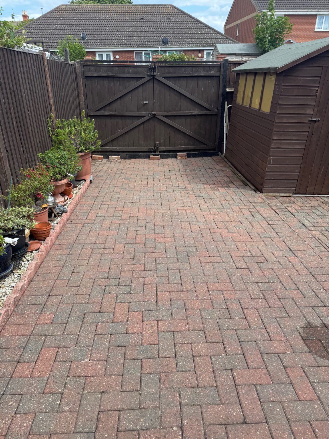 Block-paved driveway after professional pressure washing