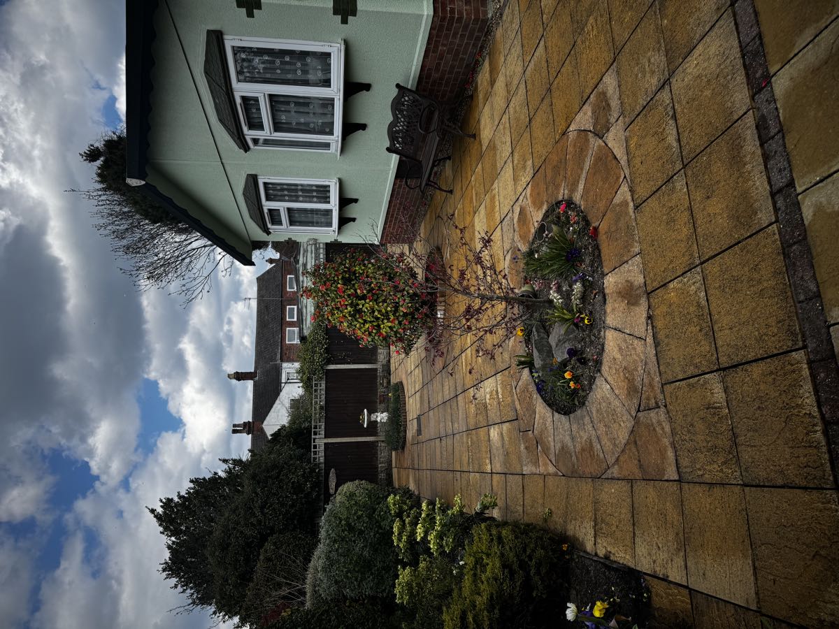 Garden patio restored after professional pressure washing