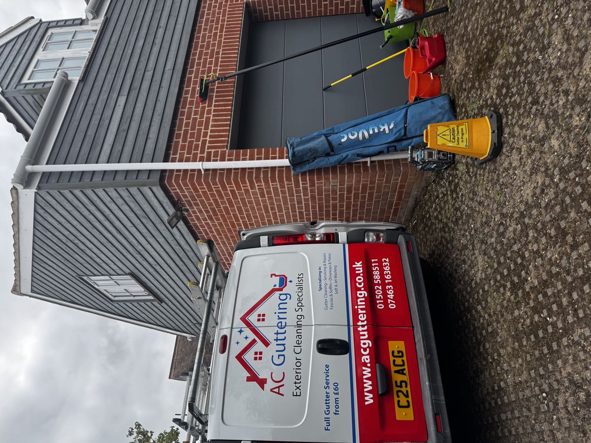 AC Guttering van and SkyVac equipment on a job